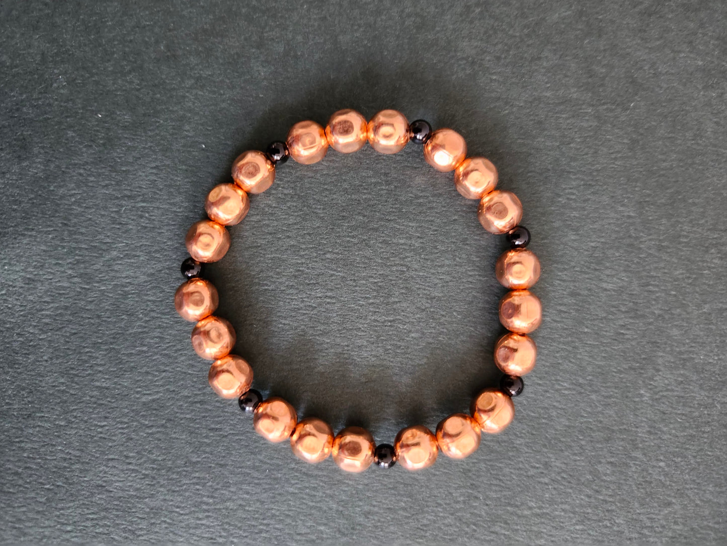 Copper Faceted Onyx 8mm